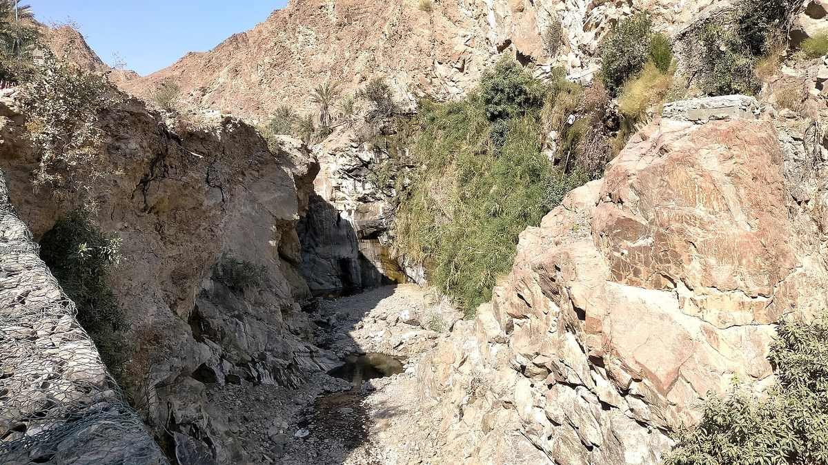 Wadi Shis — Small waterfall of Wadi Shis, also known as Wadi Ash Shis as it passes through the town of Shis, in the Emirate of Sharjah.jpg